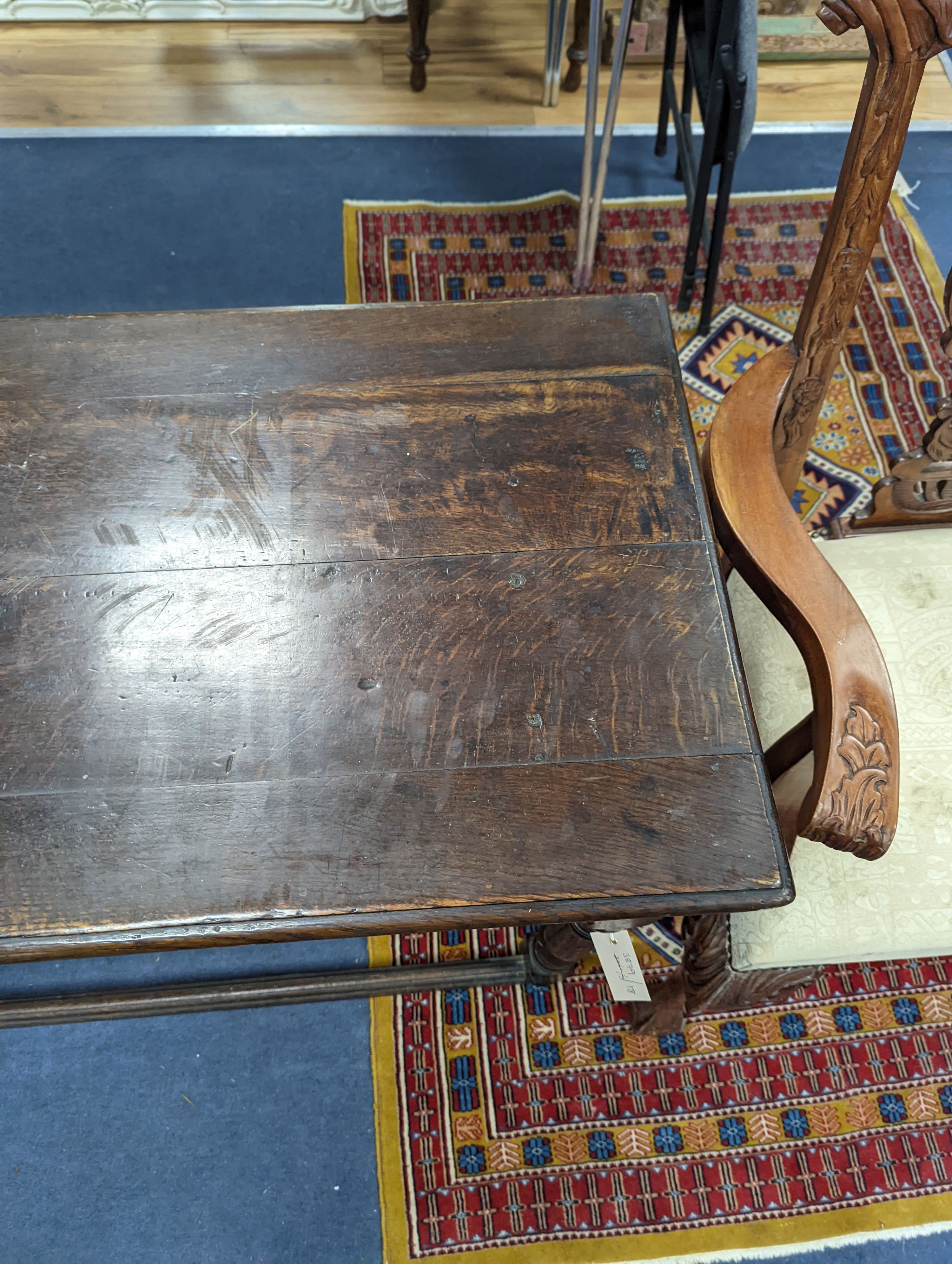 An 18th century rectangular oak table, width 112cm, depth 54cm, height 76cm